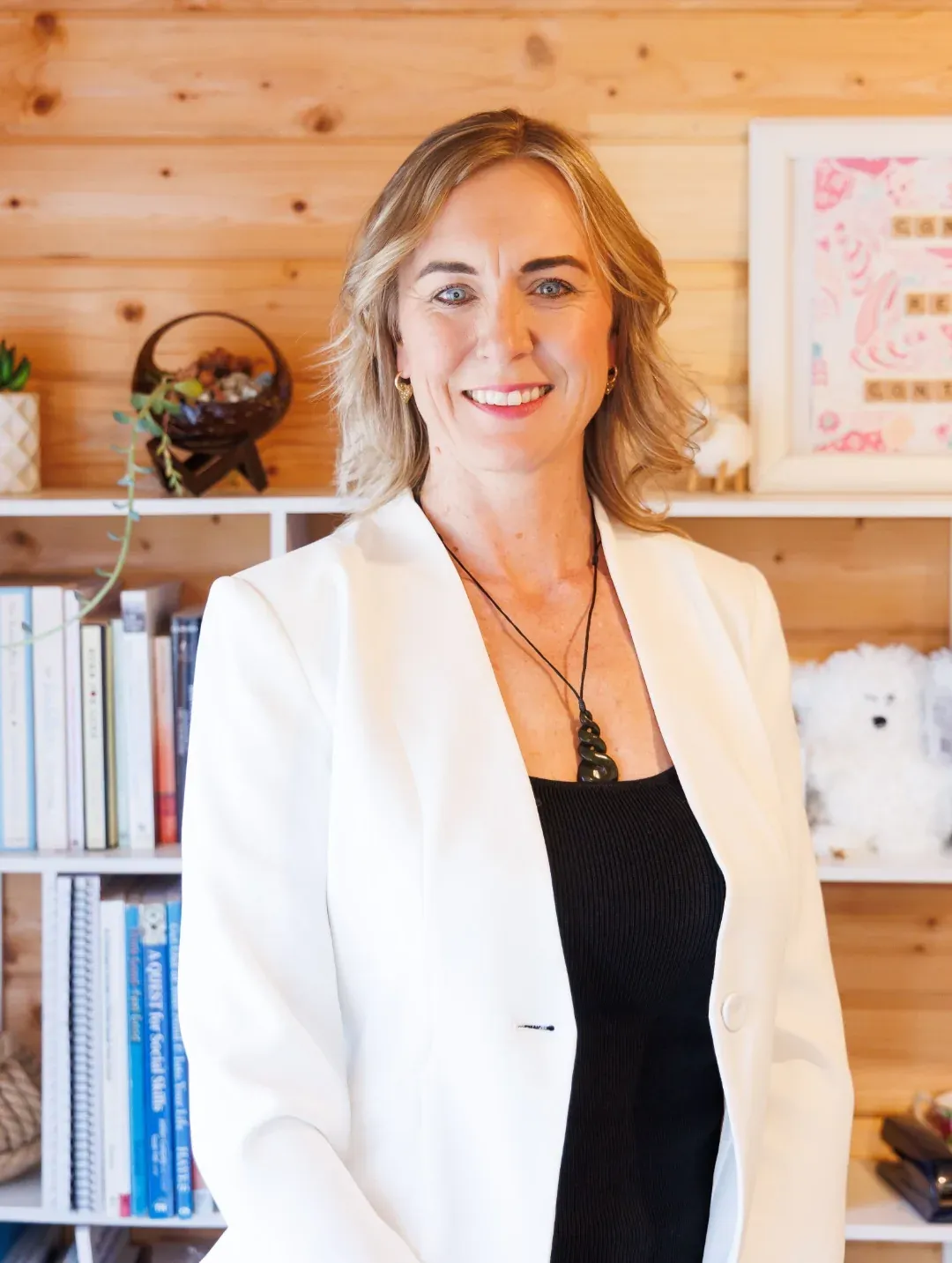 Emily Baird, Consultant Psychologist, smiling in her Christchurch practice.